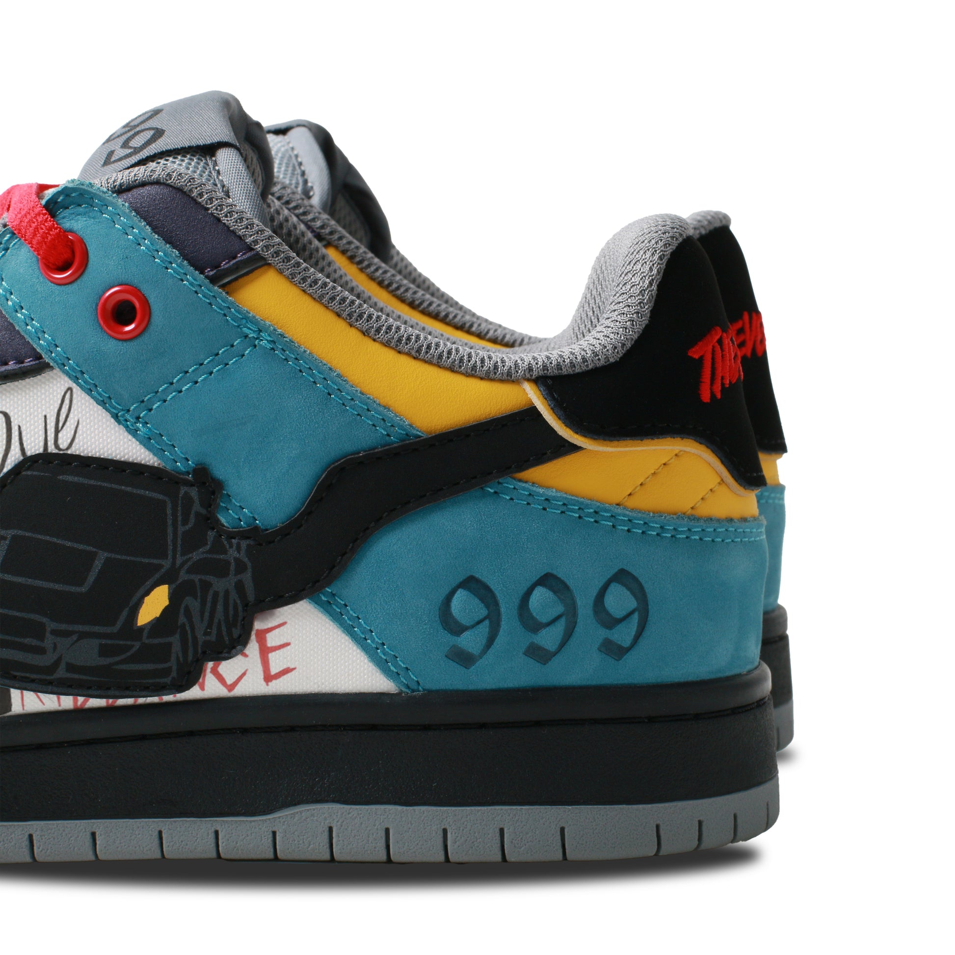 Close-up of custom shoes showing leather texture and suede details.
